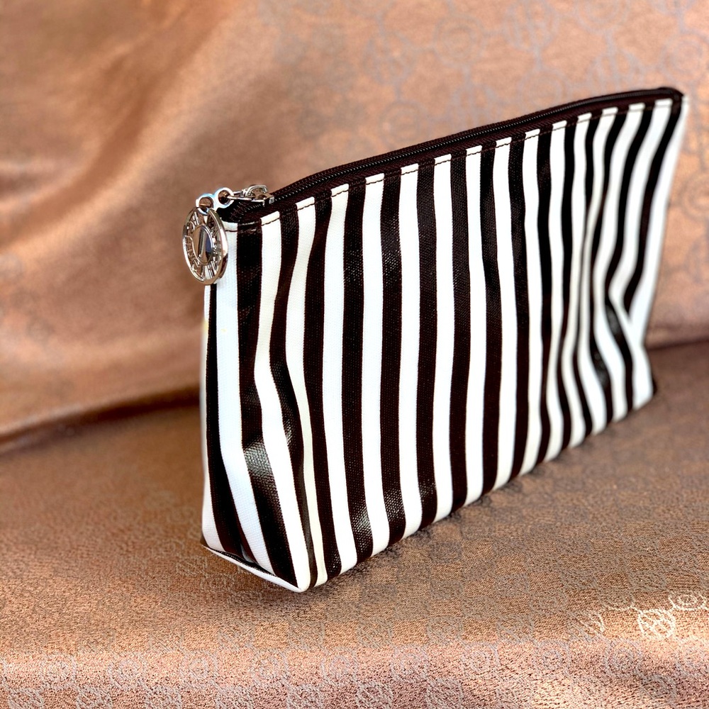 Henri Bendel centennial stripe pouch
